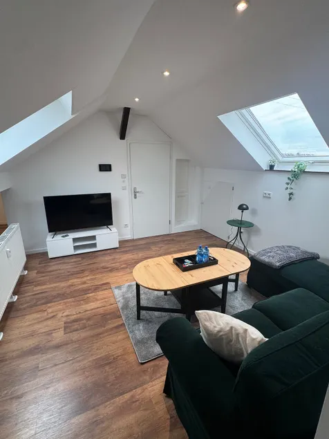 Modern attic apartment with parking - Image 1