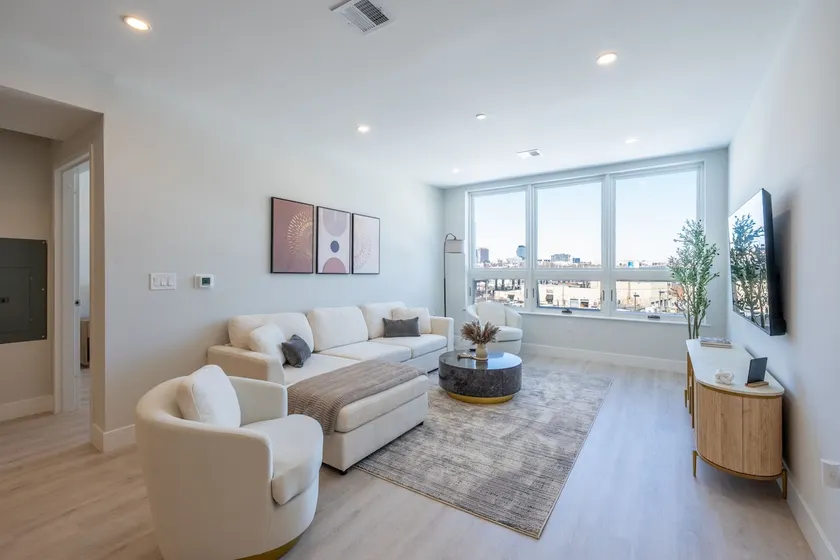 Luxe 2BR Retreat 5Min PATH to NYC Rooftop and Gym - Image 1