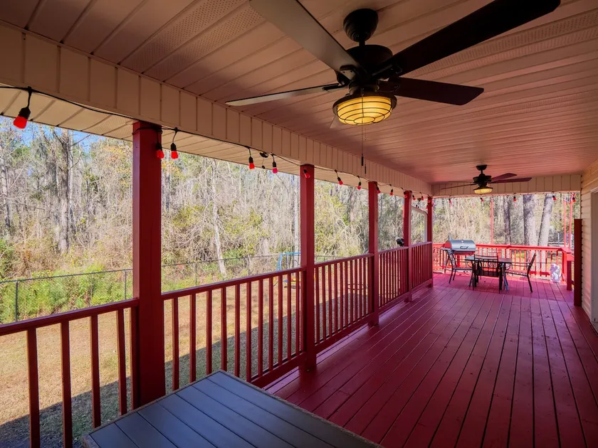 Pine-Shaded Home w/ BBQ · Covered Deck - Image 1