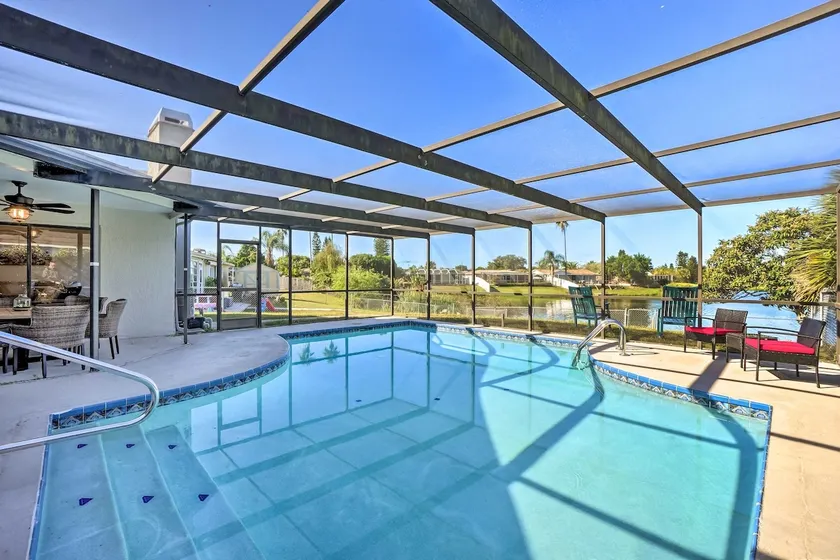 Waterfront Retreat Pool Stunning Sunsets Fishing - Image 1