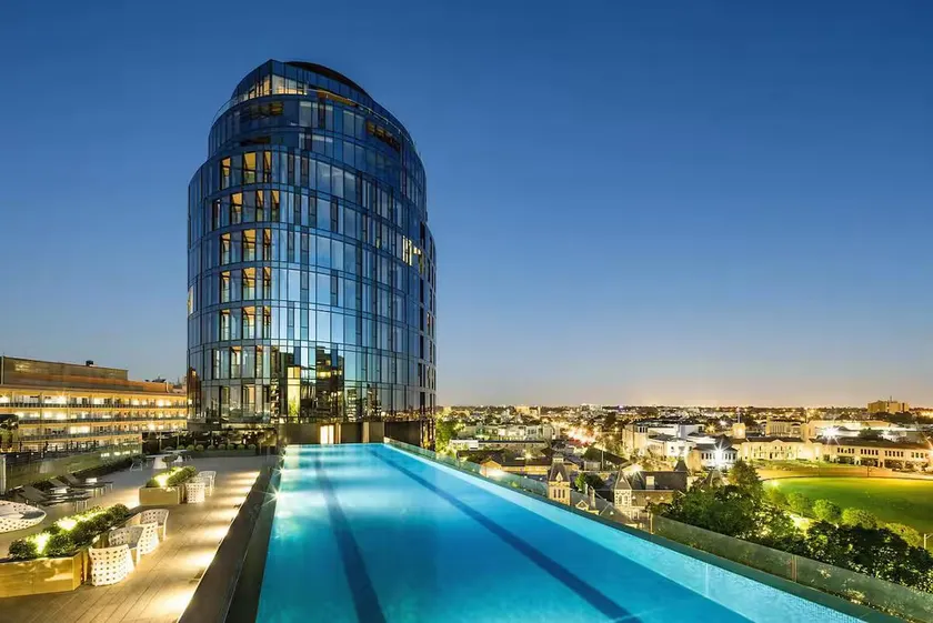 Rooftop Pool Views Sleek 1BR on St Kilda Rd - Image 1