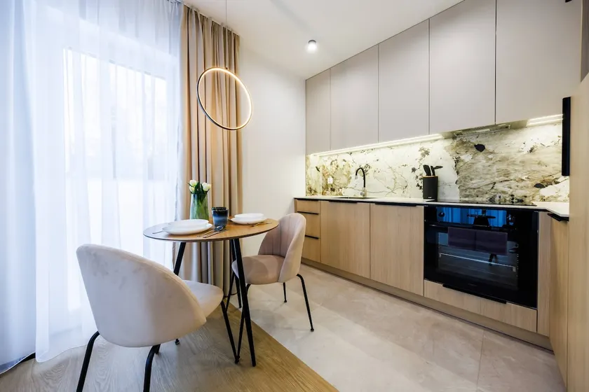 M1 Aura Apartments With AC, Free Parking by StayNest - Image 1