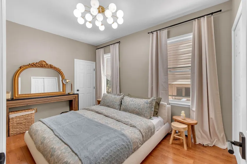 The Ember Haus: Earth-Toned 2BR Oasis Near NYC - Image 1