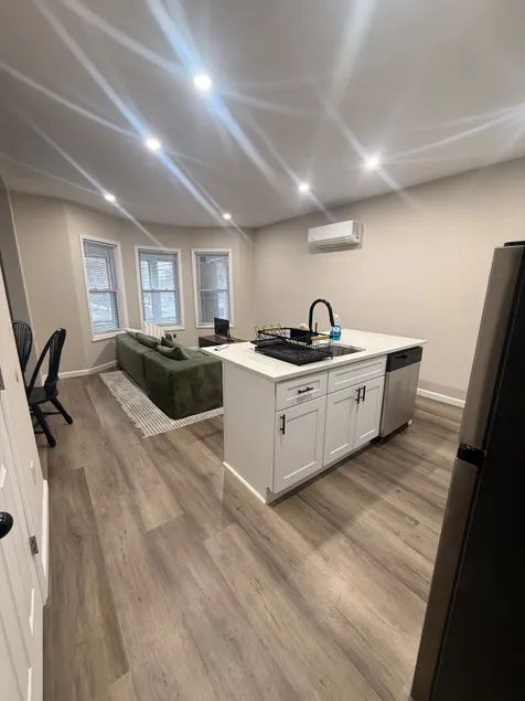 Newly Renovated 3BR/2BA with Private Attic Suite - Image 1