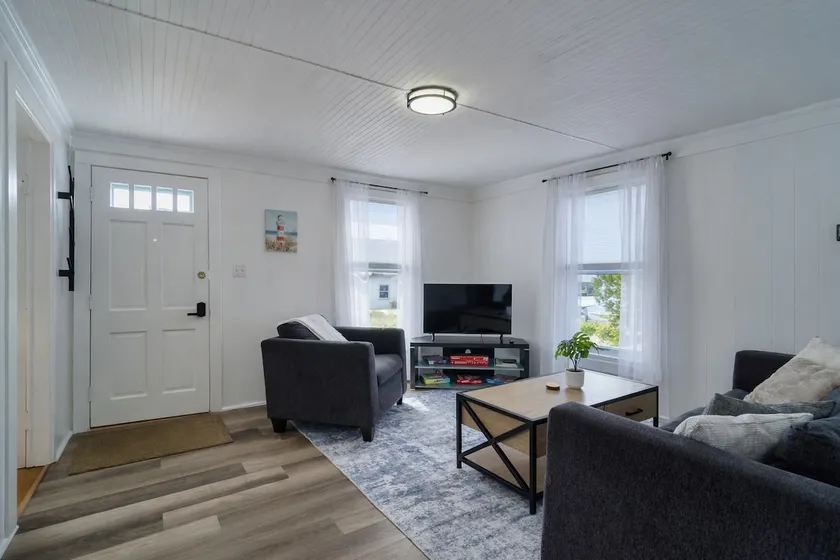 Coastal Gem - Charming 3BR Home, Steps to Beach! - Image 1
