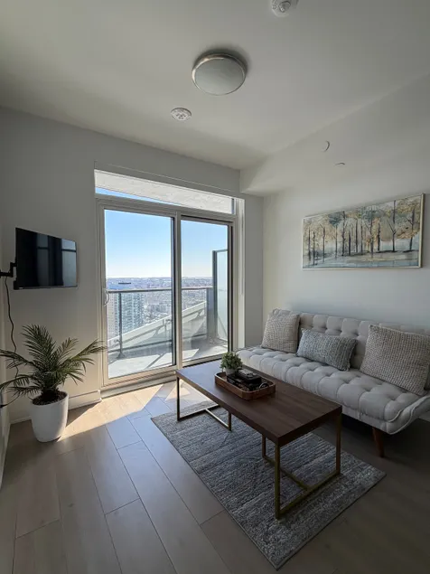 NEW High-Rise Luxury Condo! Prime Location! - Image 1