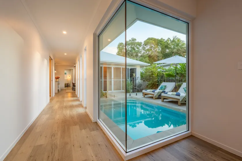 Trinity Beach Coastal Luxe Pool Retreat – 4BR - Image 1