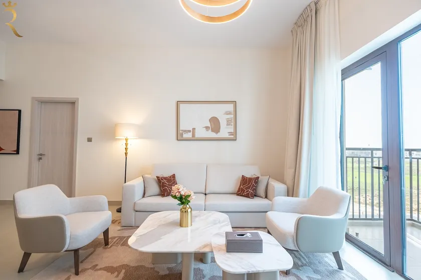 Stylish 2BR with Balcony - Chic Golfside Escape - Image 1