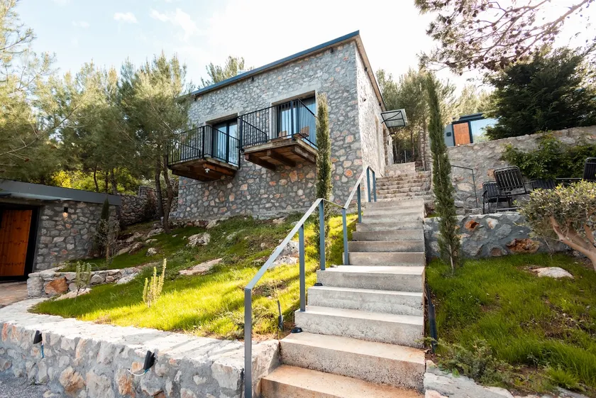 Modern Stone Sanctuary in the Woods - Image 1