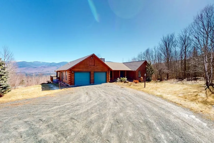 Custom 5BR with deck, wood stove, & mountain views - Image 1