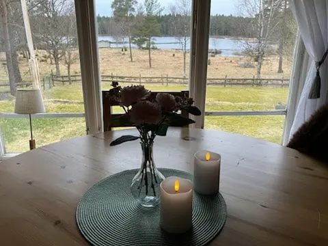 The cabin by the lake in the middle of the forest. - Image 1