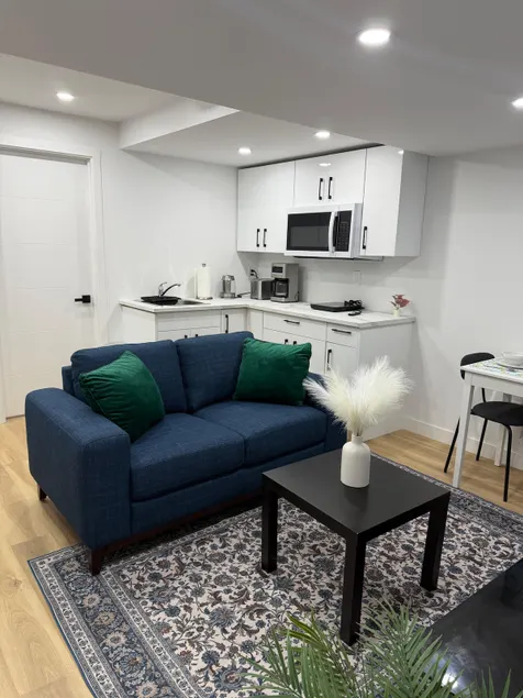 Cozy and Stylish Private Basement Suite - Image 1