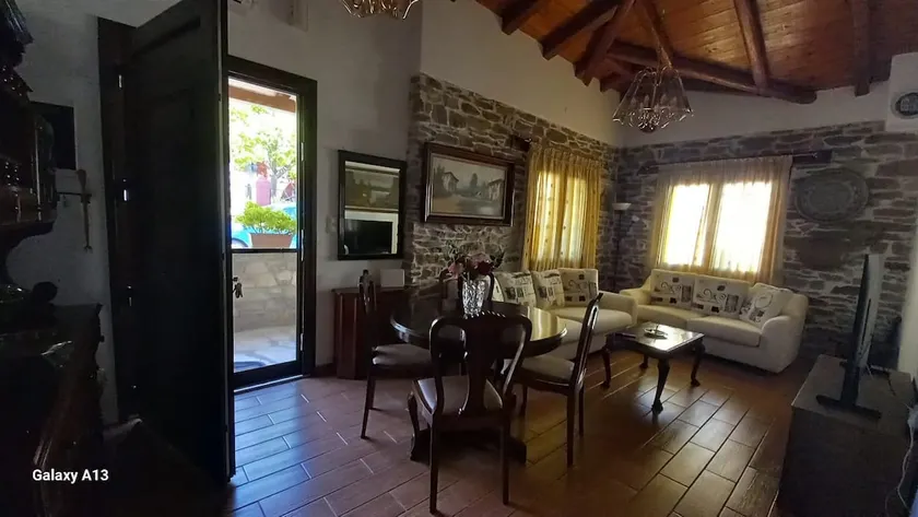 Traditional Stone House with Modern Renovation - Image 1