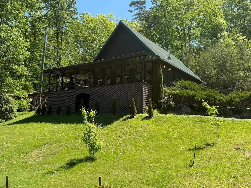 Secluded A-Frame Retreat on Private Pond - Image 1