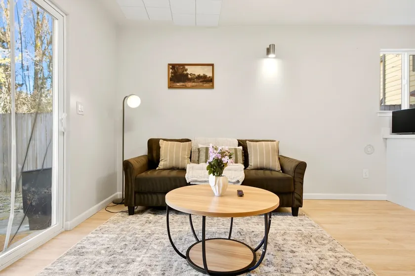 Comfy 2BR Near UW & Northgate Station w/ Backyard - Image 1