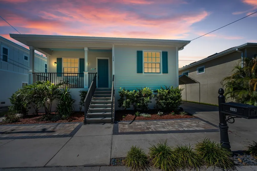 Tropical 3BR Bungalow near Sponge Docks, Downtown, Pinellas Trail, & Pickleball - Image 1