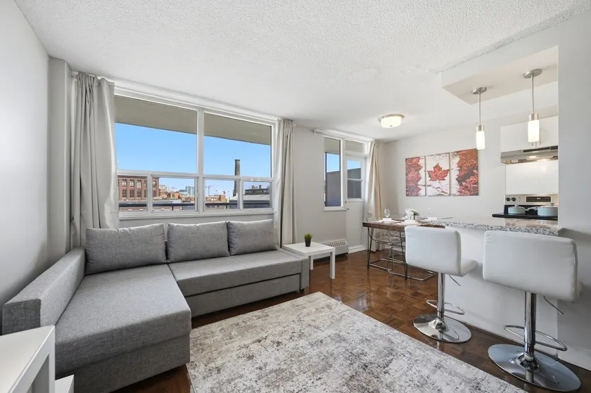 Stylish 2BR condo with 2 Balconies & Workspace - Image 1