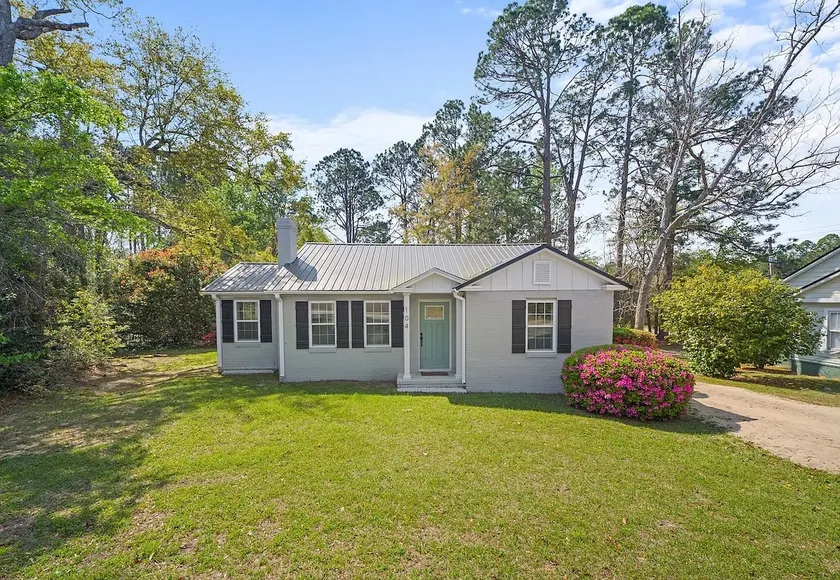 In-Town Stay w/ Private Back Deck + Fireplace - Image 1