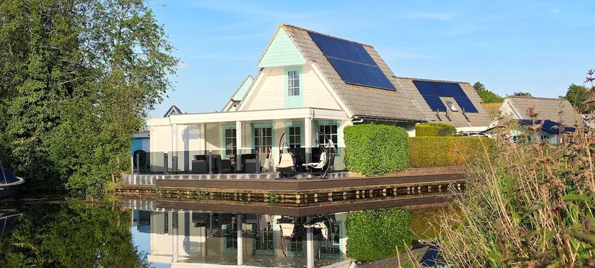 Vacation villa with hot tub, private dock, and veranda - Image 1