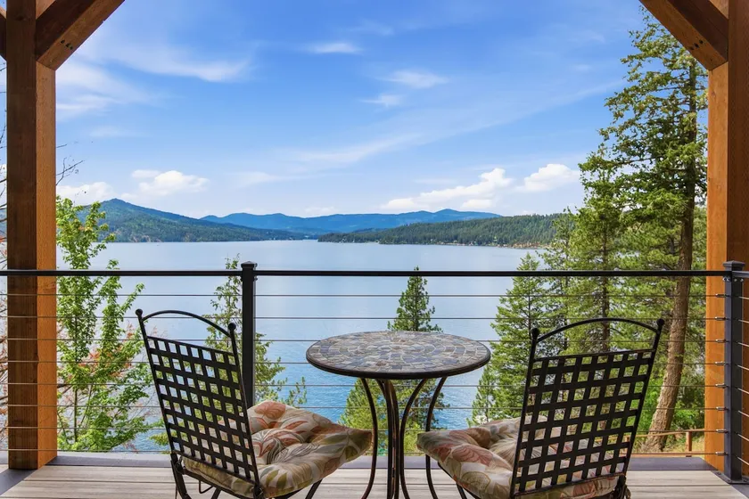 Waterfront Escape with Hot Tub & Epic Sunset Views - Image 1