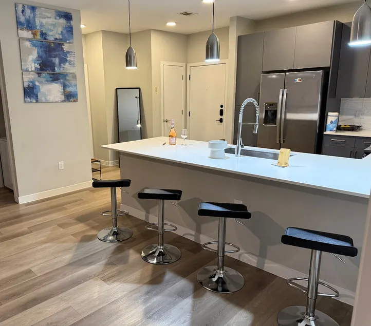 Downtown Skyline Escape| Modern Mid-rise Apartment - Image 1