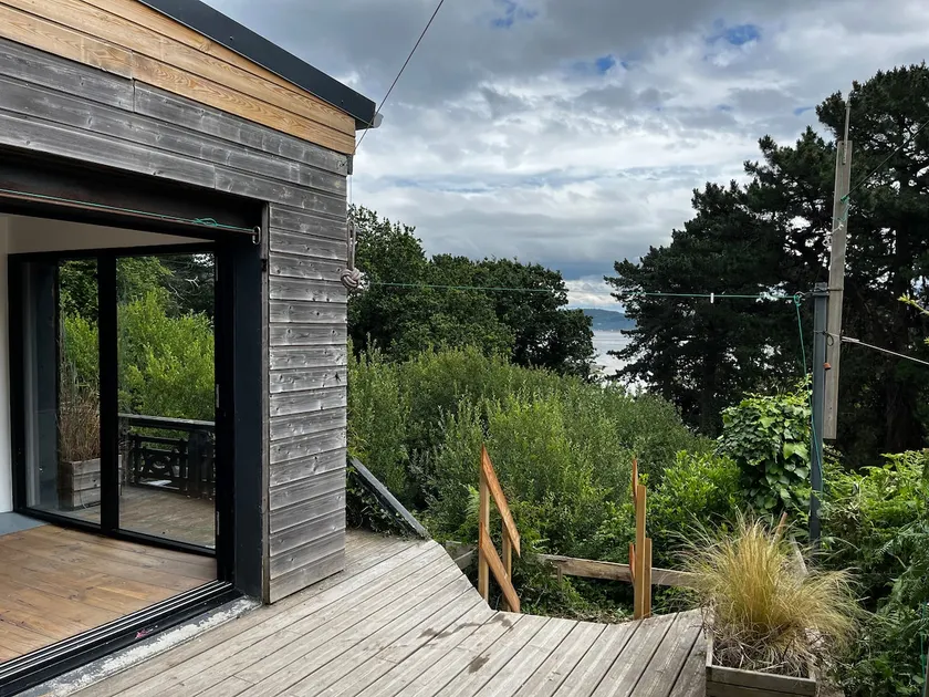 An unusual house nestled between the sea and the forest - Image 1