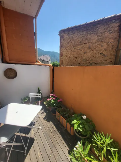 Room with flower-filled patio in the heart of the village - Image 1