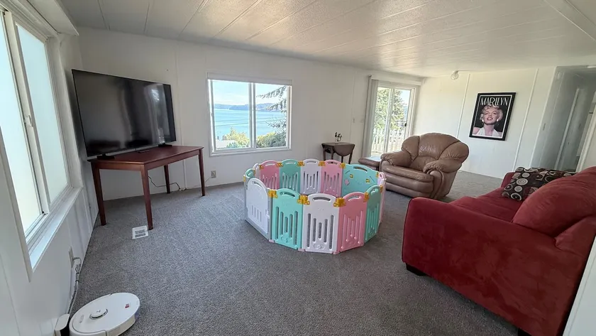 Wake up to stunning water views & private yard! - Image 1