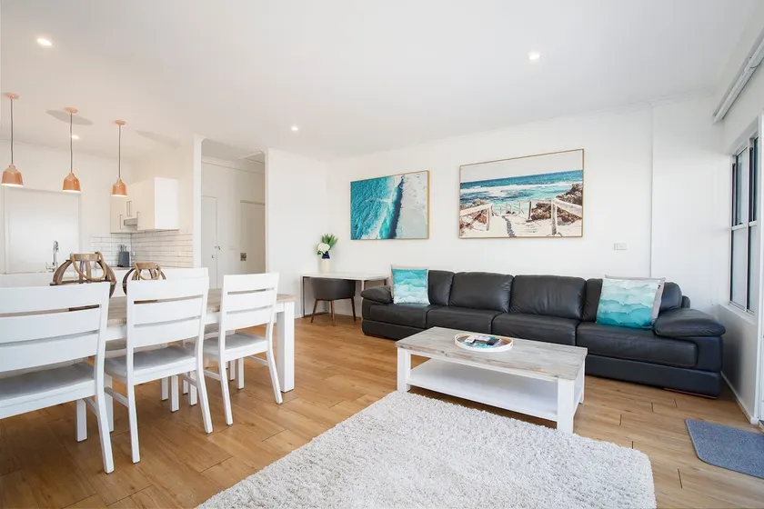 Sandy Shores: A Spacious Newcastle Beach Escape - Image 1