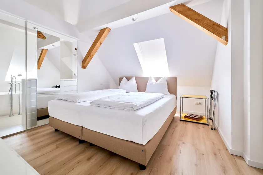 Starry sky · Studio with skylight above the bed - Image 1