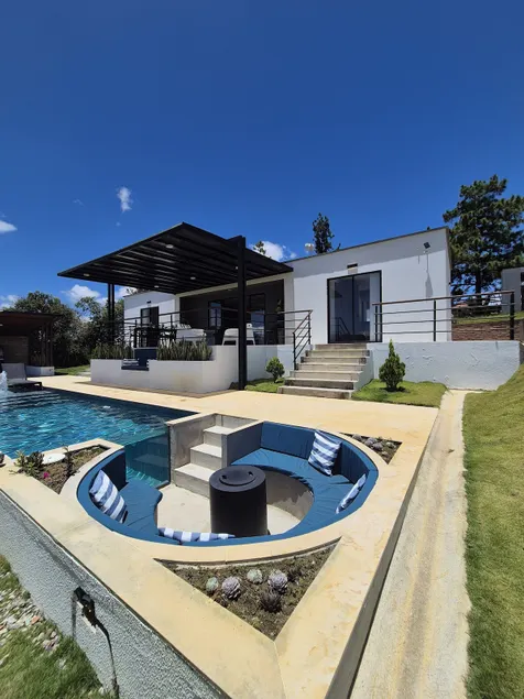 Modern villa with pool, grill, and fire pit - Image 1