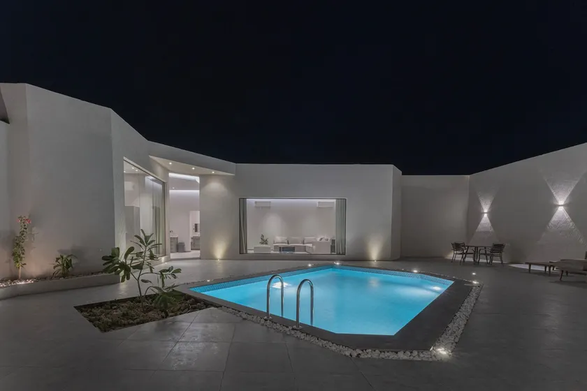Villa F with a modern design, pool, and outdoor seating in Al-Amariyah - Image 1