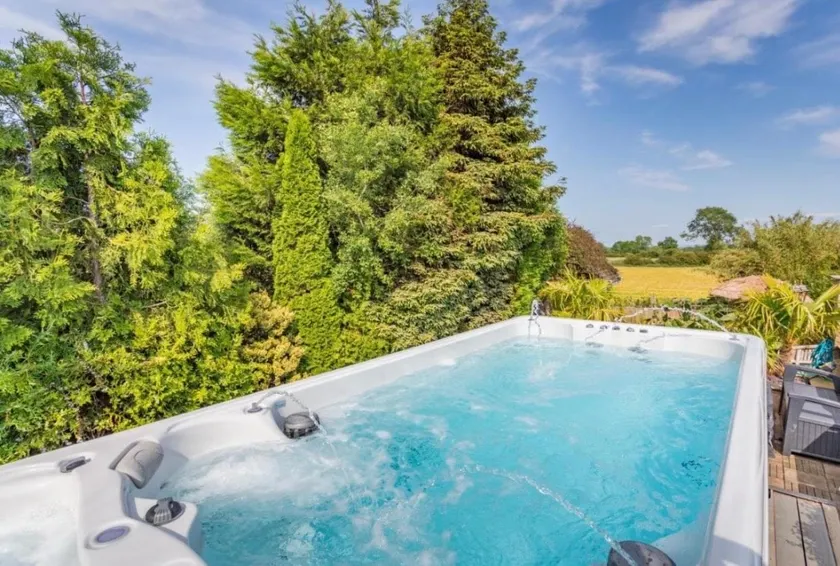 Caesars Spa Retreat with Heated Swim Spa & Waterfall Gardens - Image 1