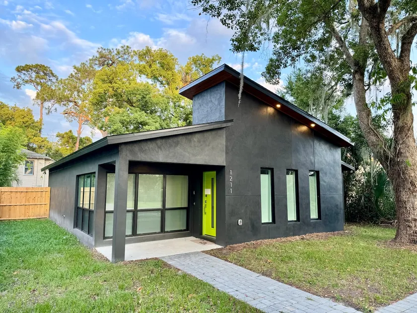 Modern house with sauna and fenced yard - Image 1