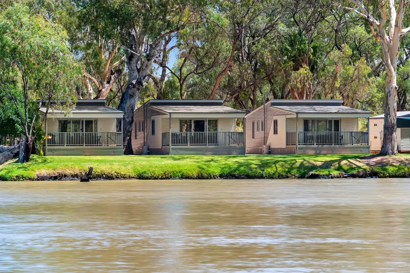 Premium Riverfront Cabins - Image 1