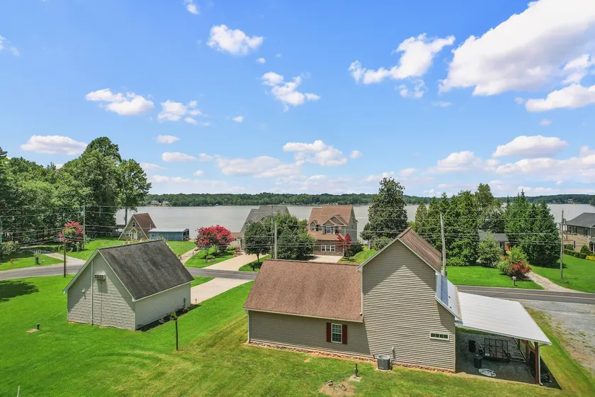 Lakefront Paradise with Sunset Views & Guesthouse! - Image 1