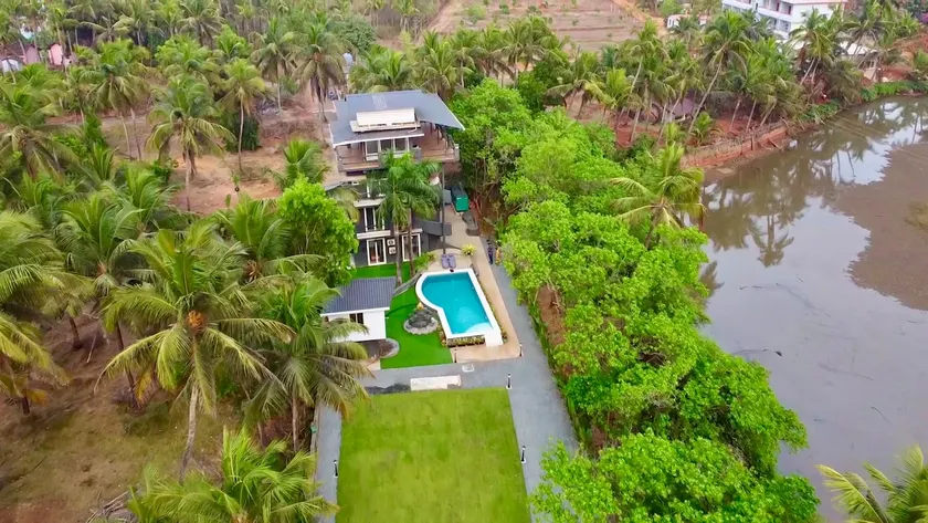 Casa Noir | 4BHK Pool Villa | Waterfront - Image 1