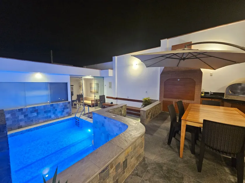 A house with a swimming pool, waterfall, grill, and artesian oven - Image 1