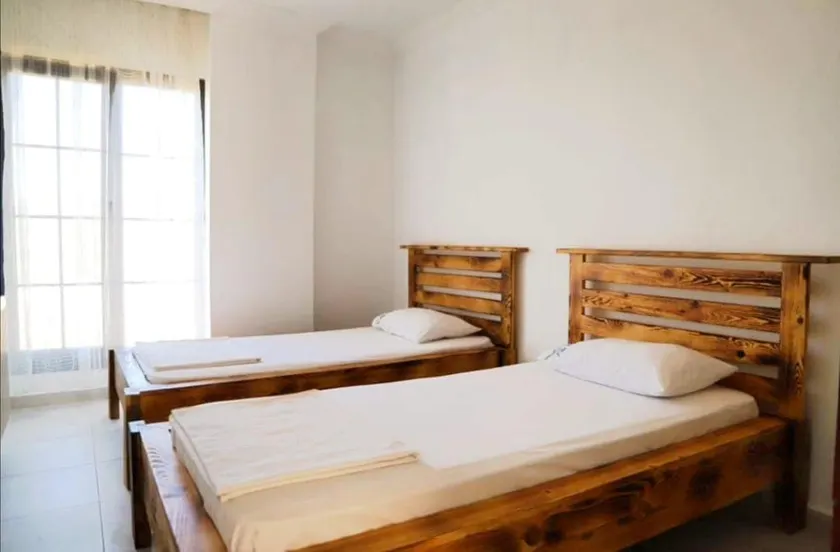 2+1 apartment with large garden in Gökçeada - Image 1