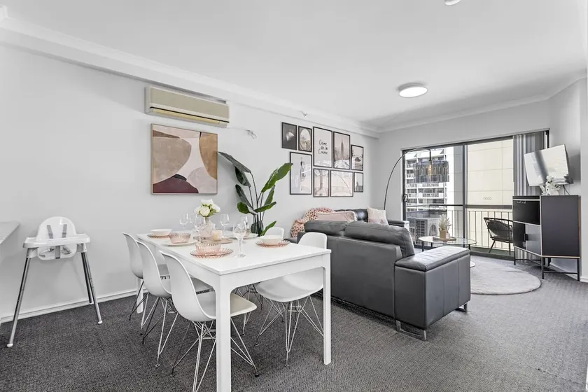 Modern Urban Escape: 2BR with South-Facing Balcony - Image 1