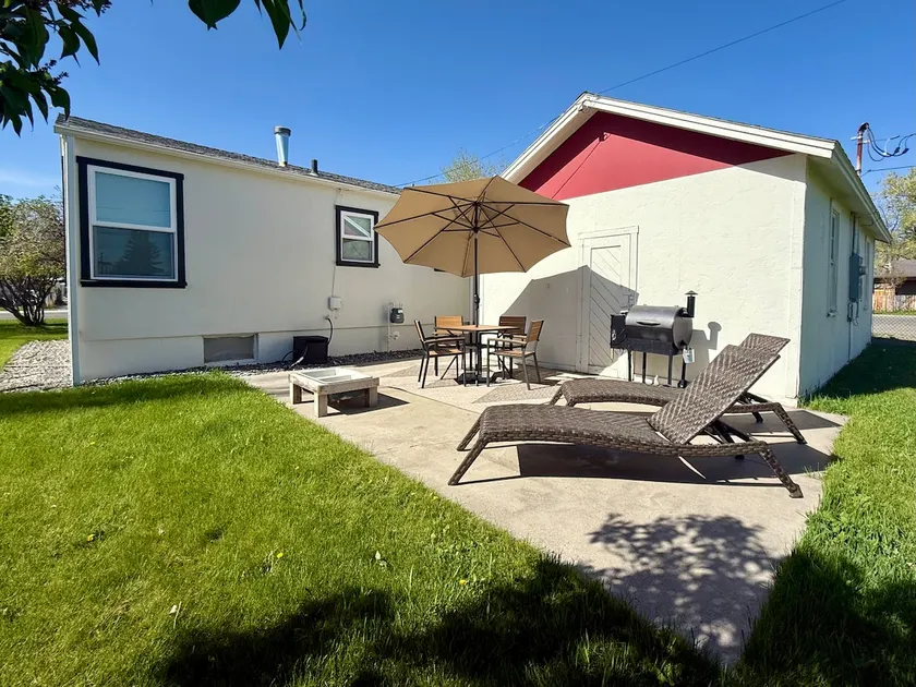 Mid-Century Cody Retreat • 2BR + Peaceful Backyard - Image 1