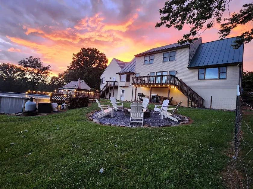 Finished Basement with a pool and a fire pit - Image 1