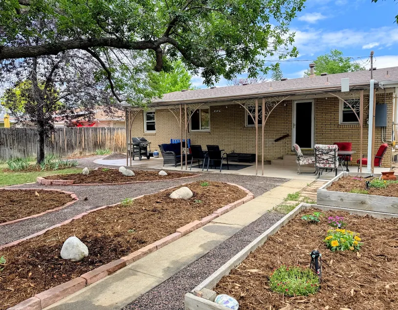 Central Location with Covered Patio & Yard - Image 1