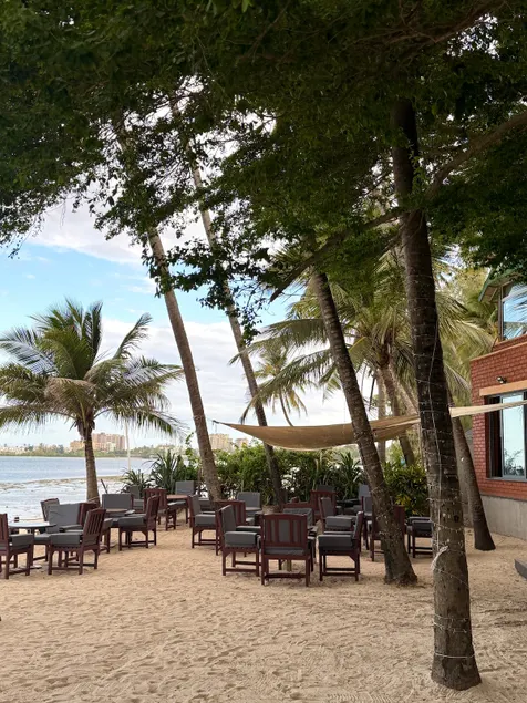 Beachfront 2BR Retreat | Pool • Restaurant & Café - Image 1