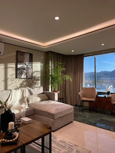Suite bedroom and living room with a wide view - Image 1