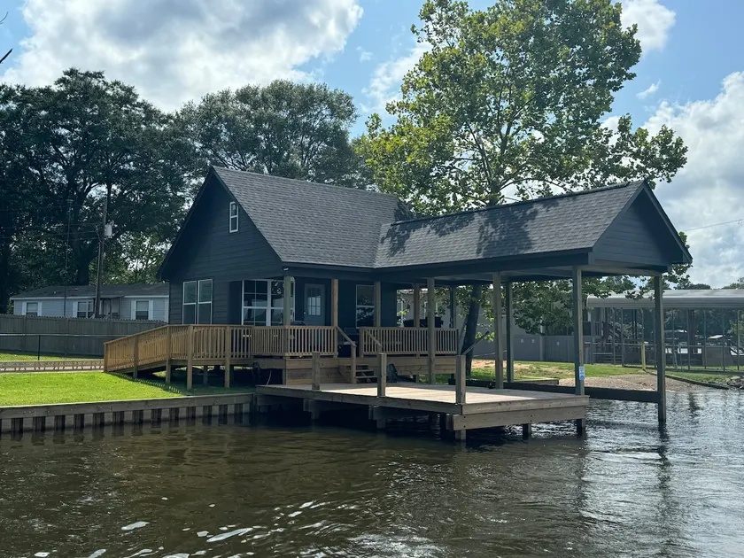The Blue cabin with boat slip and dock. - Image 1