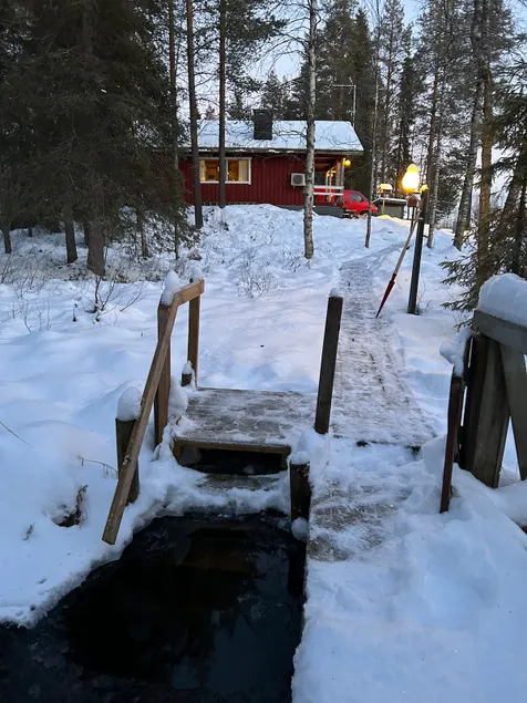 Cabin with traditional sauna by a small creek - Image 1
