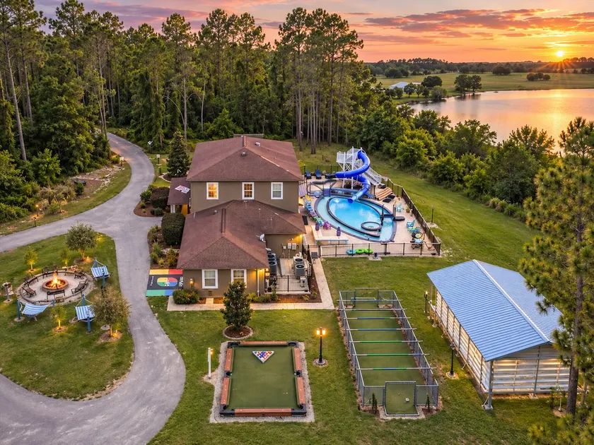 Lakefront Estate · Pool & Waterslide · Sleeps 45 - Image 1