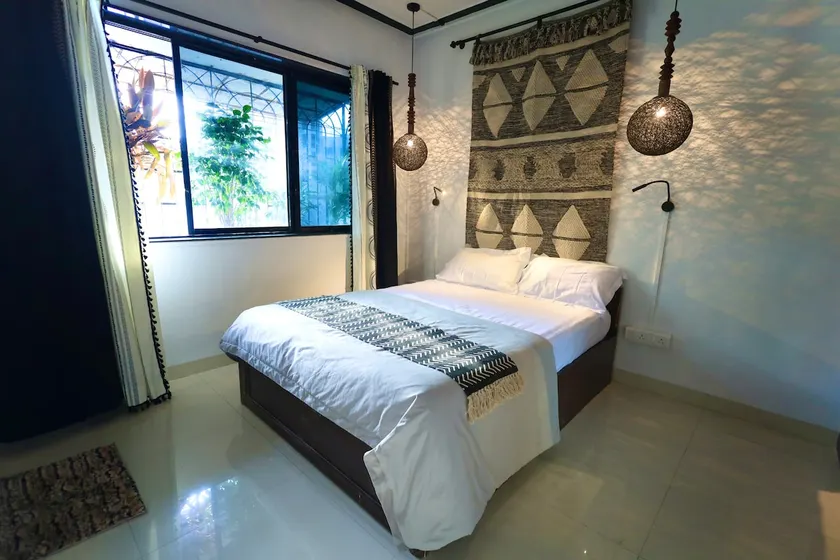 The Quaint Afrohemian 1BHK (Bandra West) - Image 1