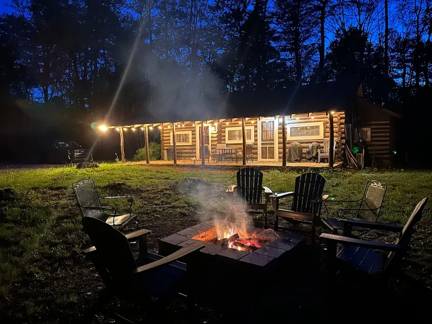 Rustic log cabin on the river - Image 1